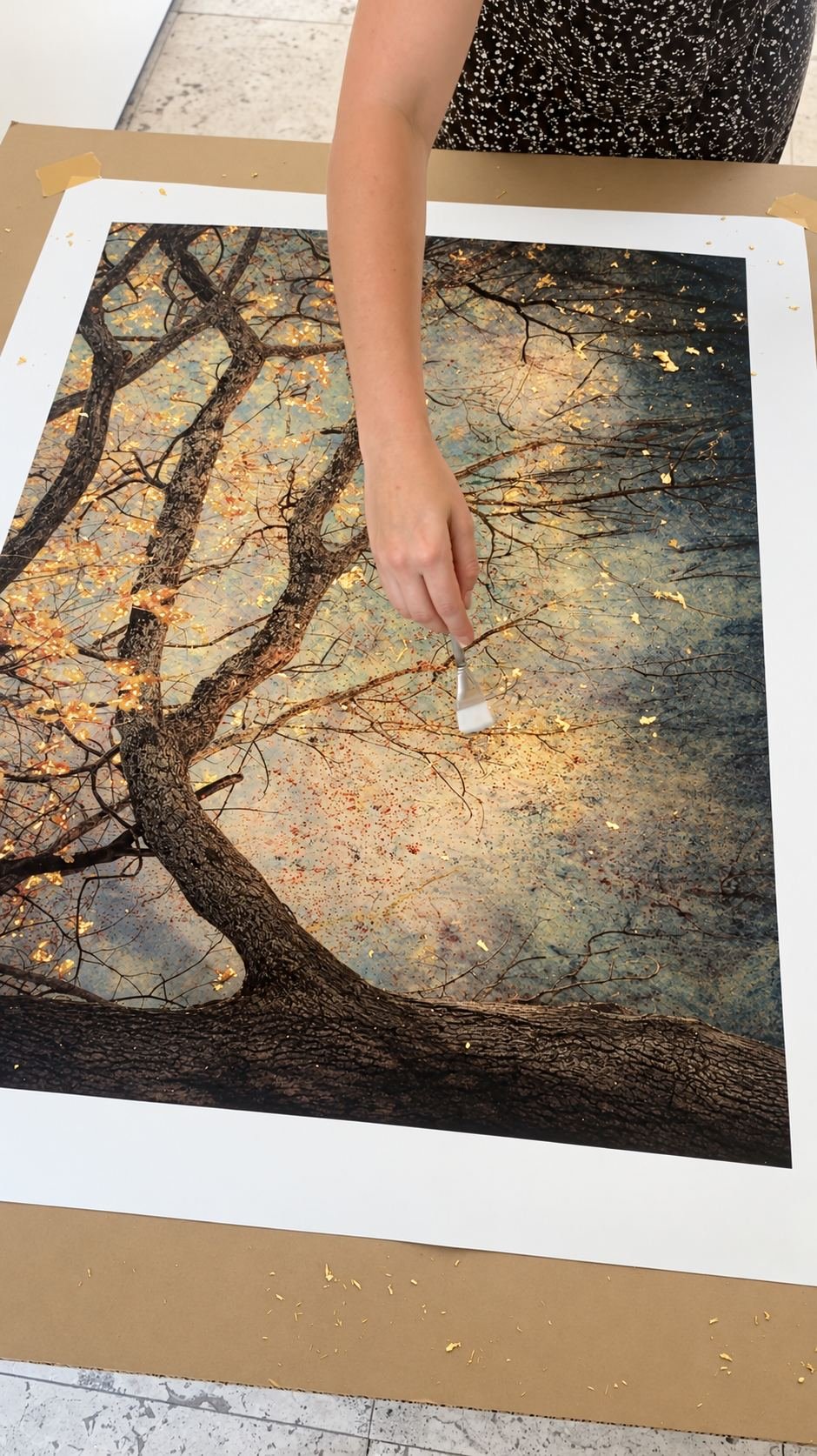 Samantha Lee Osner working into a fine art print by hand